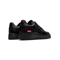 Nike Air Force 1 Low: Black Leather with Distinctive Red Supreme Details
